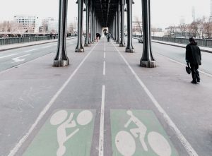 Pop-up bike lane in Paris which appears to be located on a bridge between two regular roads.