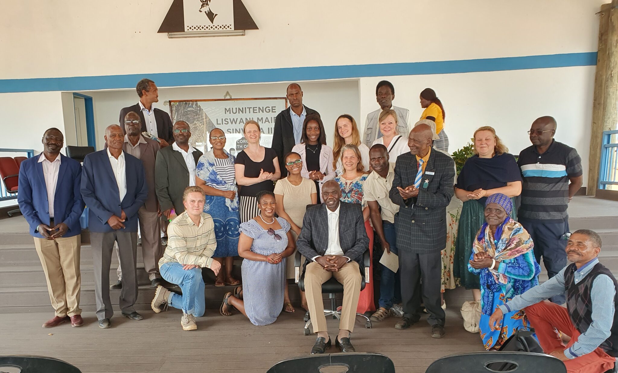 Picture of a group of people in a community meeting place.