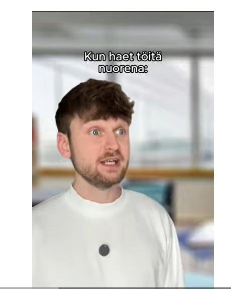 Kuvassa kuvakaappaus YouTubesta somevaikuttaja Taneli Lahtisesta, mies katsoo kuvassa sivuun ja on kuin selittämässä jotain. 